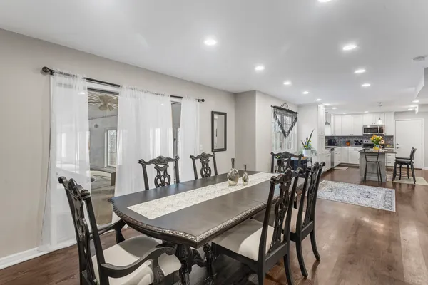 a view of a dining room with furniture