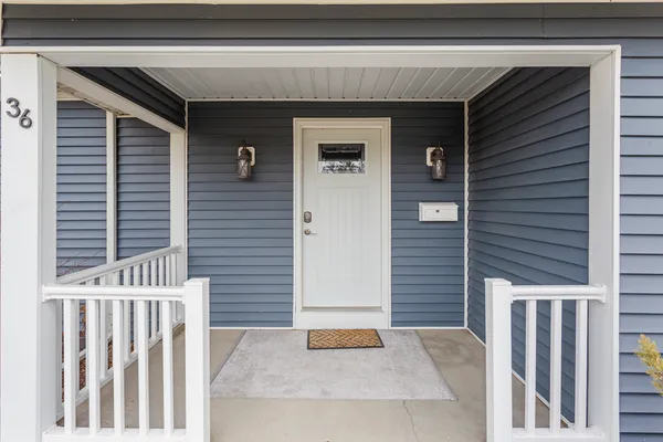 a front view of a house with a garage