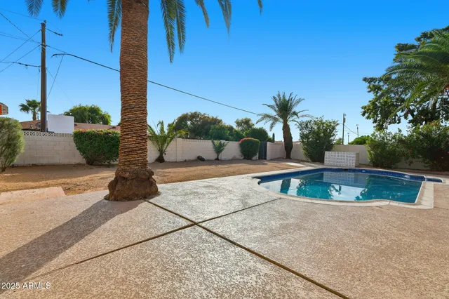 a view of outdoor space yard and swimming pool