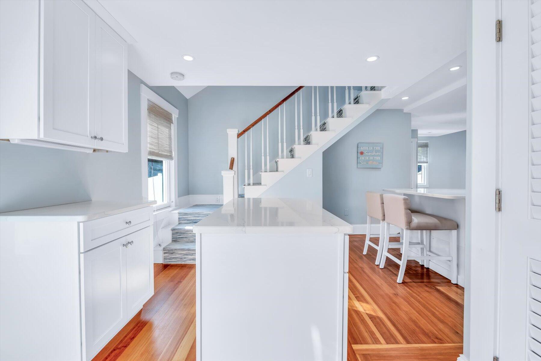 22 Bay View Avenue Buzzards Bay, MA 02532 - Photo 12 of 42 a view of a kitchen with furniture and an empty room