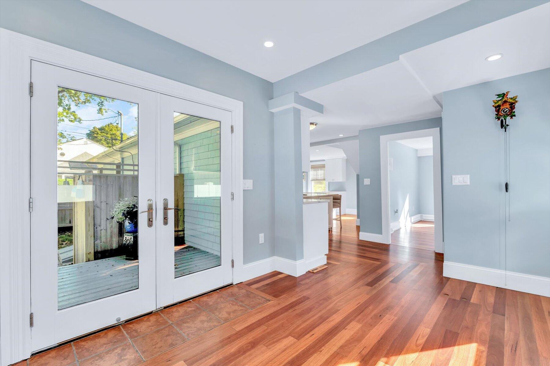 22 Bay View Avenue Buzzards Bay, MA 02532 - Photo 15 of 42 a view of a hallway with wooden floor and windows