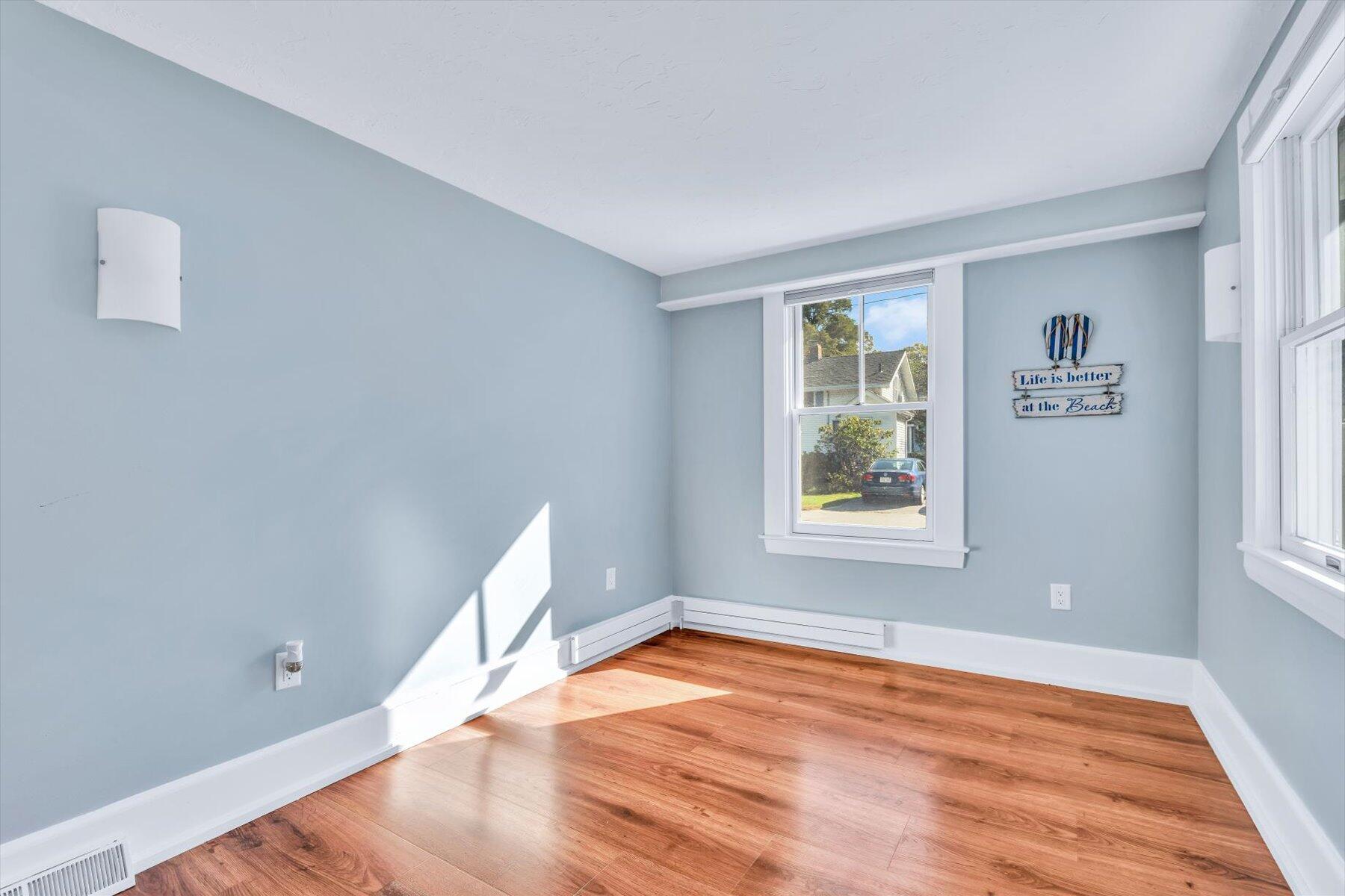 22 Bay View Avenue Buzzards Bay, MA 02532 - Photo 25 of 42 a view of empty room with wooden floor and fan