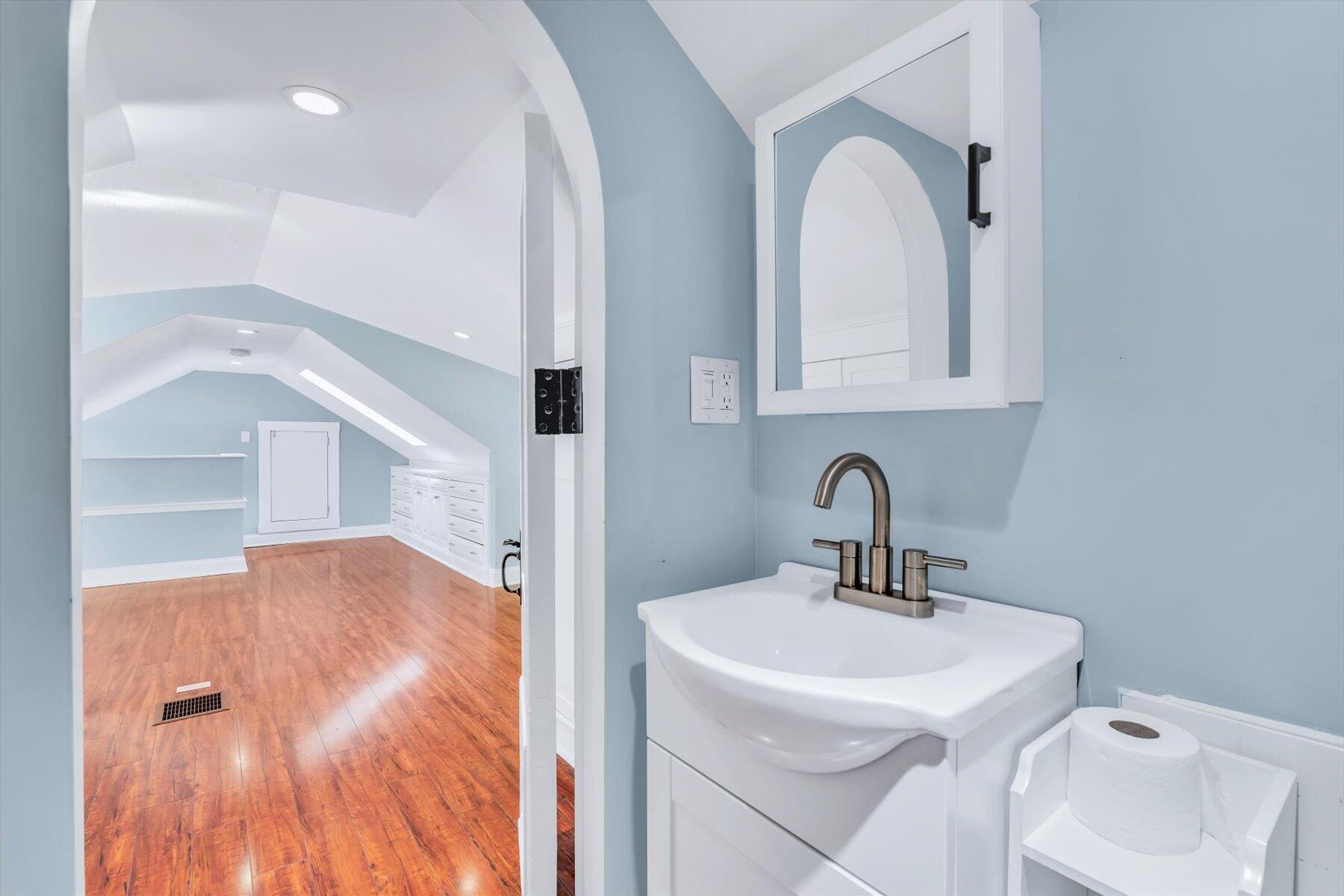 22 Bay View Avenue Buzzards Bay, MA 02532 - Photo 30 of 42 a bathroom with a sink and a mirror