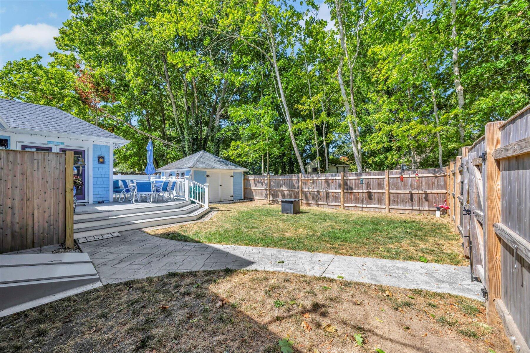 22 Bay View Avenue Buzzards Bay, MA 02532 - Photo 32 of 42 a view of a backyard with tree s