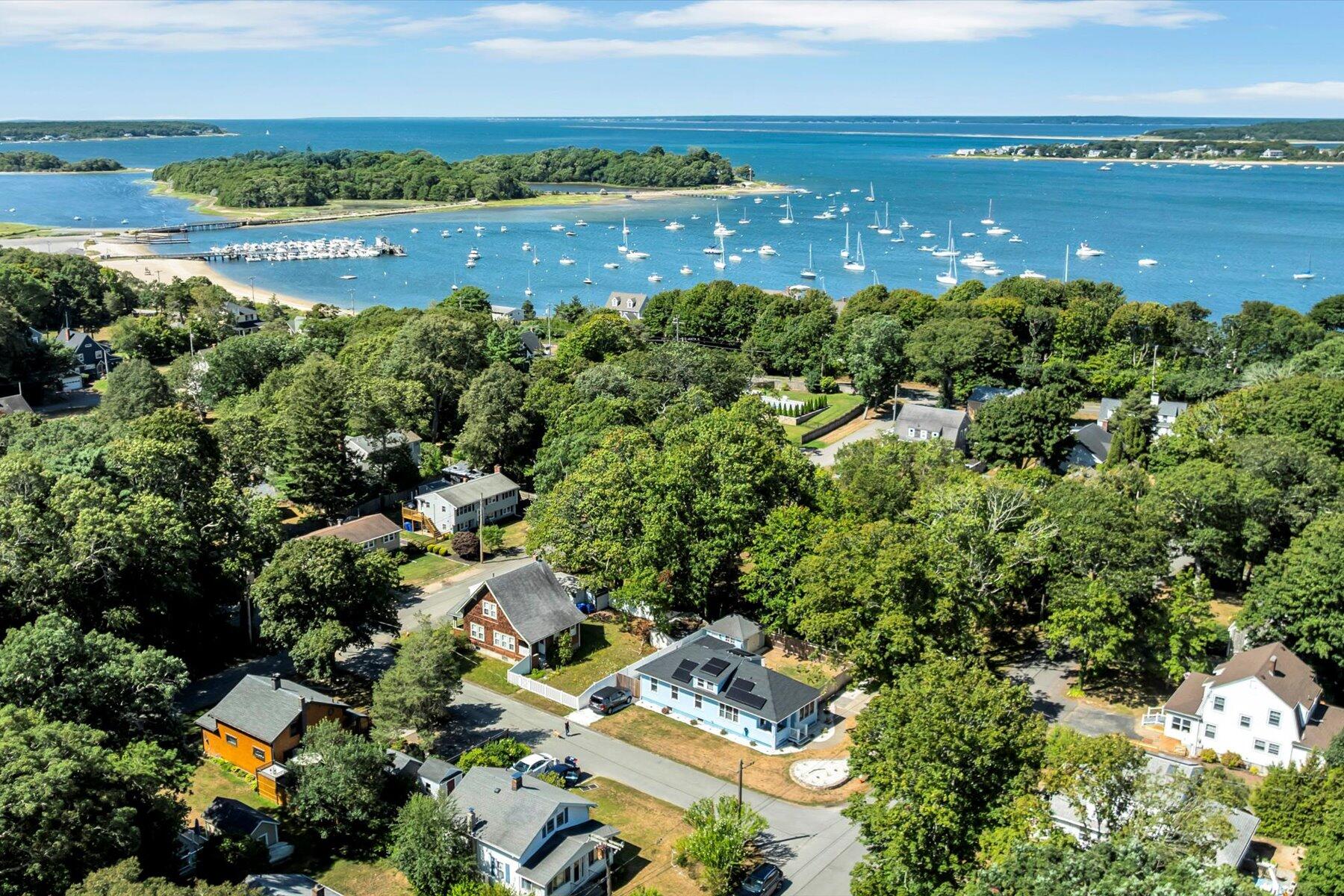 22 Bay View Avenue Buzzards Bay, MA 02532 - Photo 6 of 42 aerial view of a city with lots of residential buildings ocean and mountain view in back