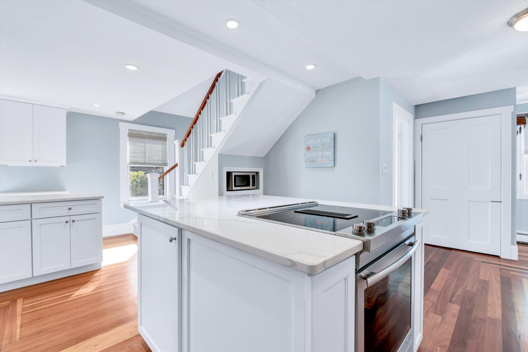22 Bay View Avenue Buzzards Bay, MA 02532 - Photo 8 of 42 a kitchen that has a sink a stove and cabinets