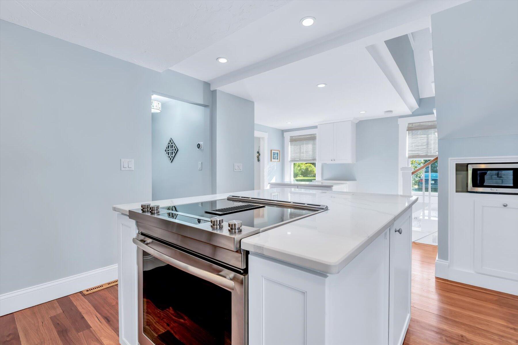 22 Bay View Avenue Buzzards Bay, MA 02532 - Photo 9 of 42 a kitchen that has a sink a stove and wooden floor