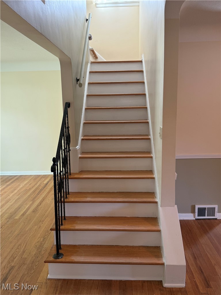 1284 Haverston Road Lyndhurst, OH 44124 - Photo 24 of 43 Stairs with wood finished floors