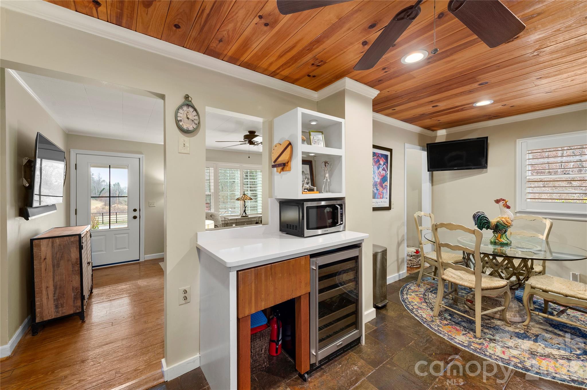 514 Roy Forrester Road Mars Hill, NC 28754 - Photo 13 of 25 a open kitchen with cabinets and chairs