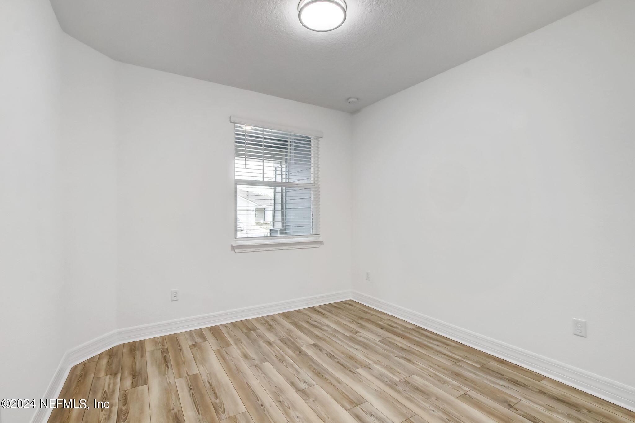 524 Jubilee Circle Yulee, FL 32097 - Photo 15 of 25 an empty room with a window