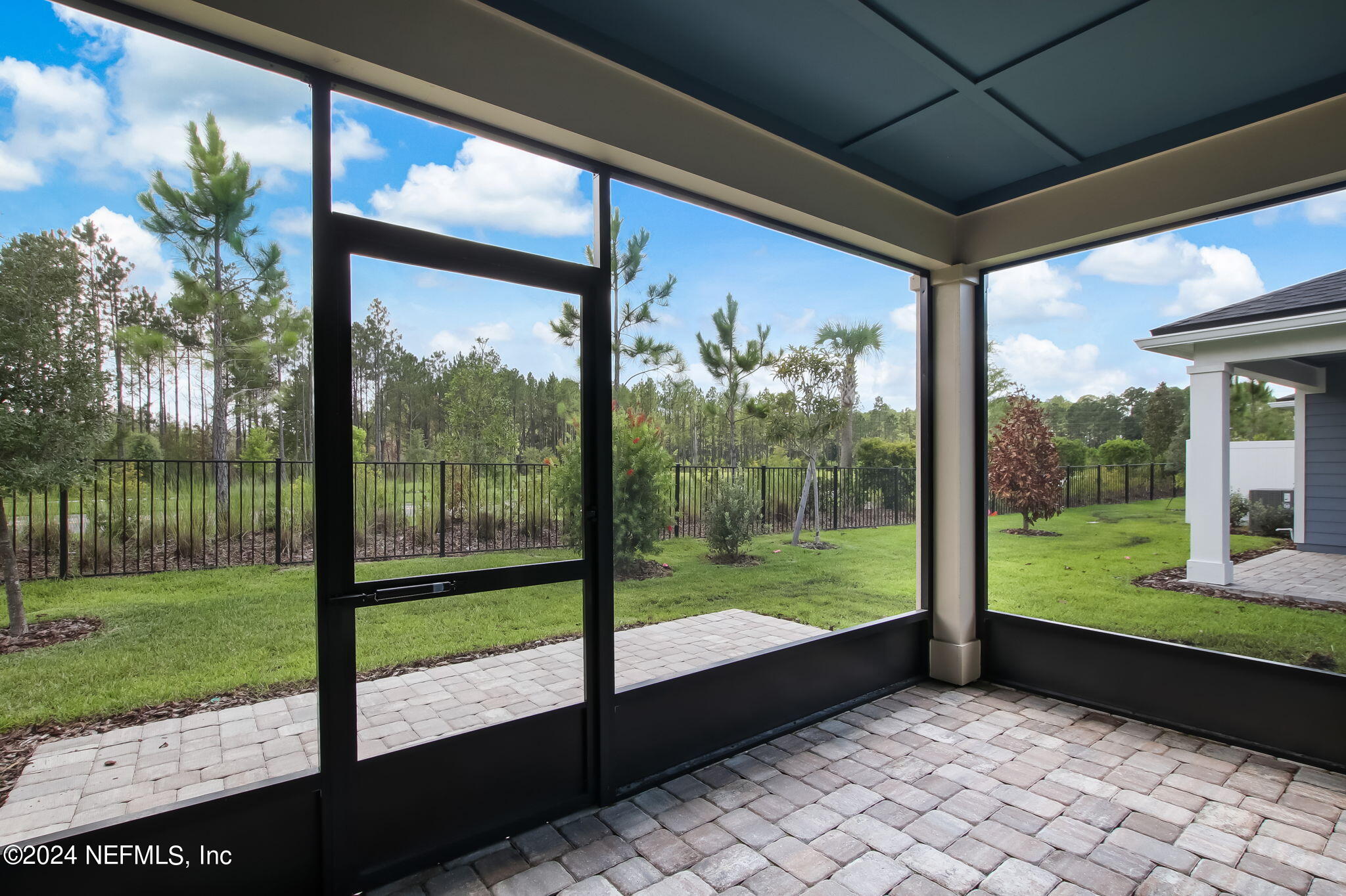 524 Jubilee Circle Yulee, FL 32097 - Photo 18 of 25 a view of a room with porch and a big yard