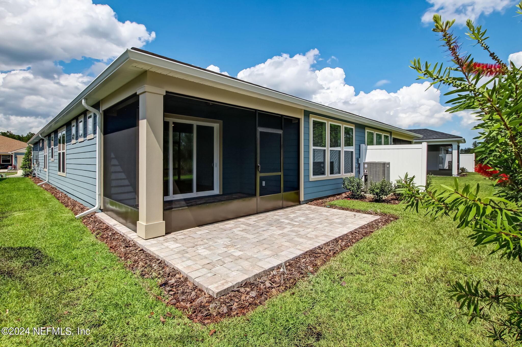 524 Jubilee Circle Yulee, FL 32097 - Photo 20 of 25 a front view of a house with garden