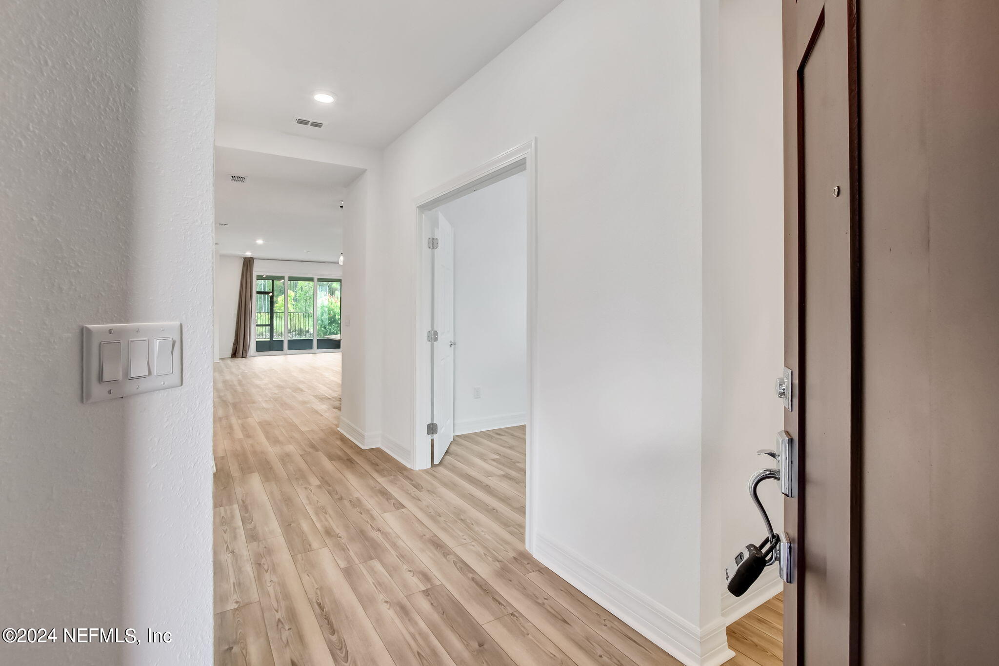 524 Jubilee Circle Yulee, FL 32097 - Photo 21 of 25 a view of entryway with wooden floor