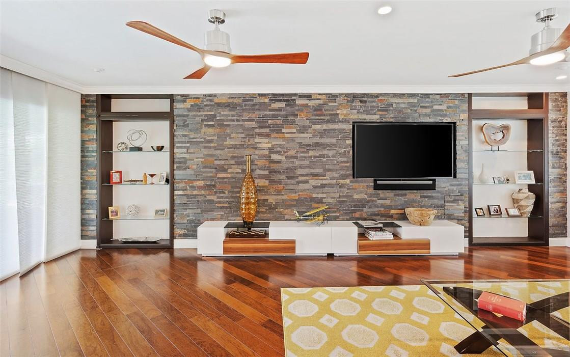 807 Berkley Street Boca Raton, FL 33487 - Photo 7 of 34 a living room with furniture and a flat screen tv
