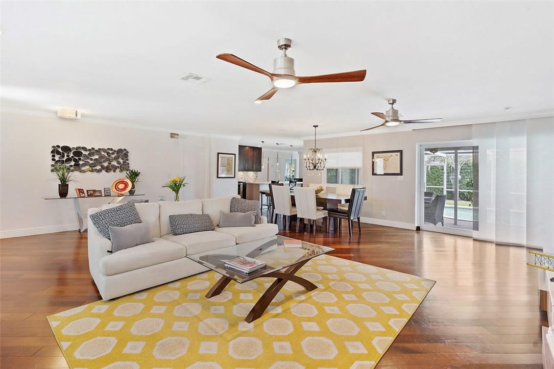 807 Berkley Street Boca Raton, FL 33487 - Photo 8 of 34 a living room with furniture and wooden floor