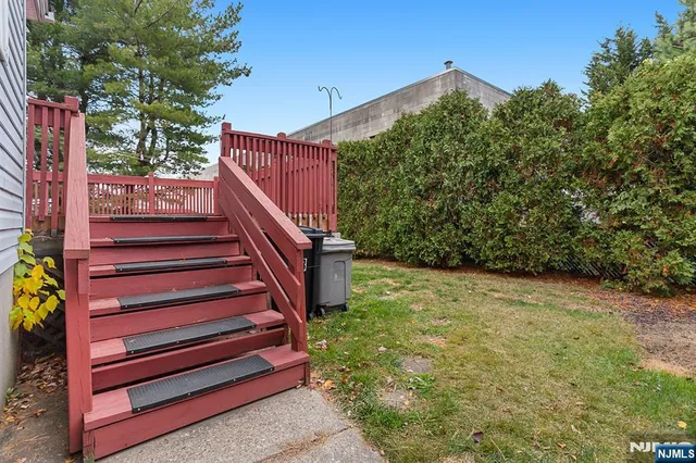 a view of stairs and flowers