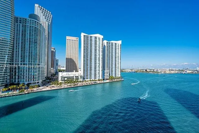 a view of a city with tall buildings