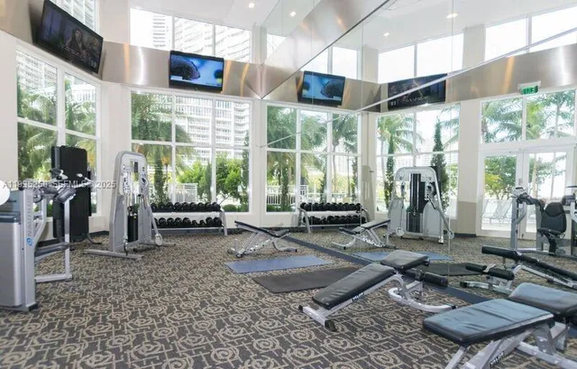 a view of a room with gym equipment