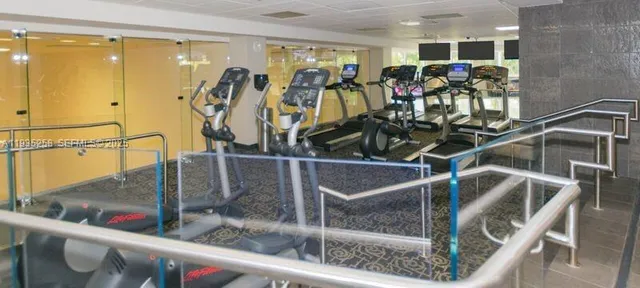 a large bathroom with a double vanity sink and mirror