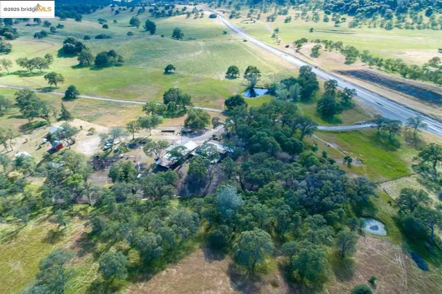 an aerial view of a house with a garden