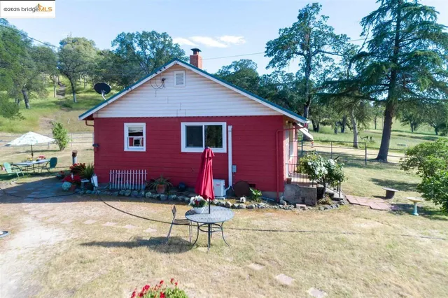a view of house with outdoor space