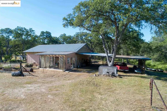 a view of a lake with a yard