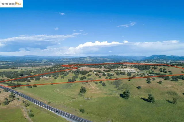 a fire hydrant in the middle of a field