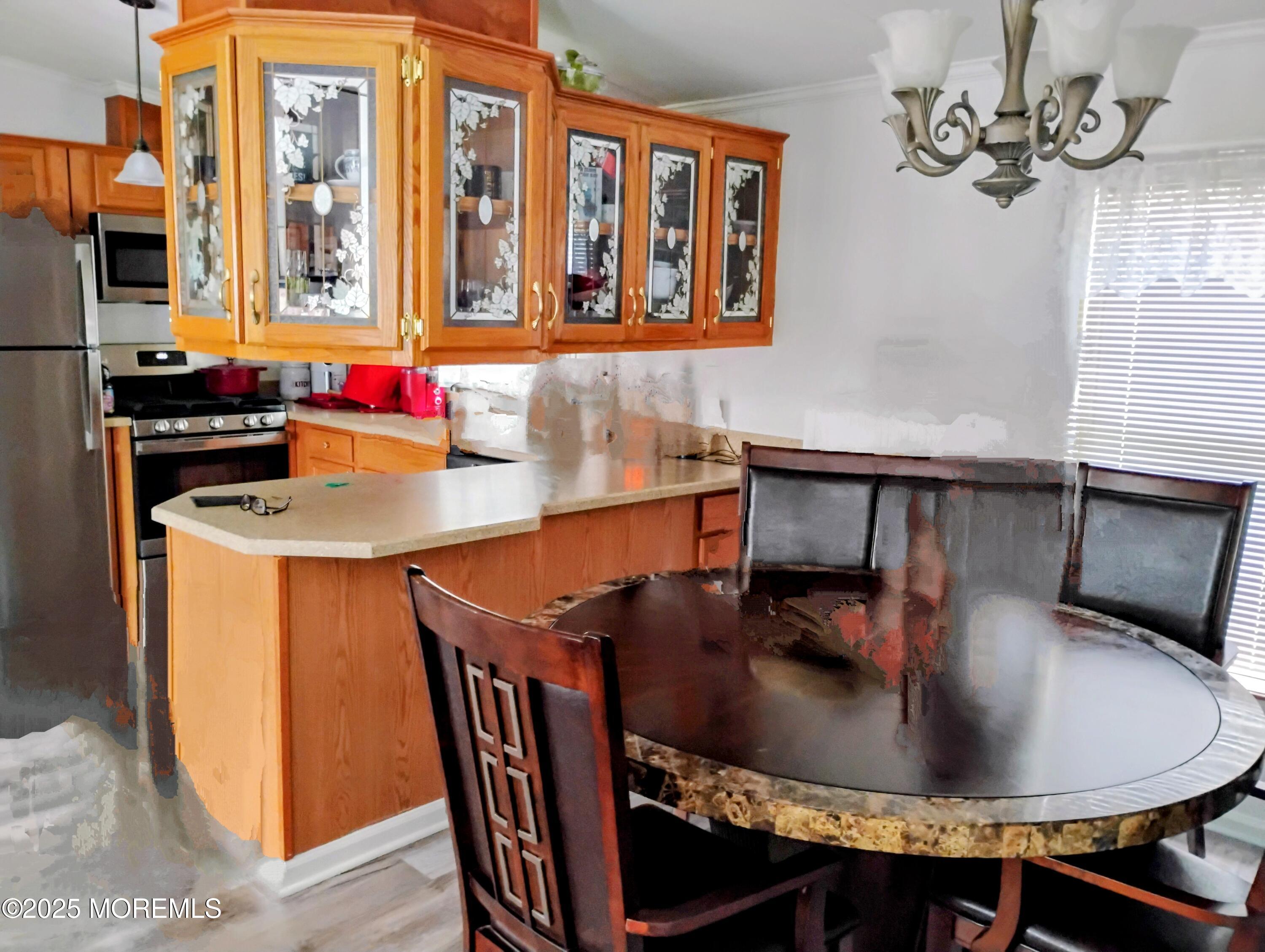 26 Pine Ridge Boulevard Whiting, NJ 08759 - Photo 6 of 16 a dining room with furniture and window