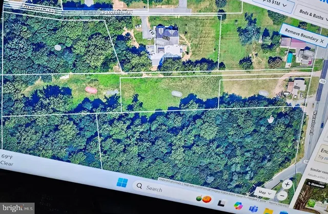 a view of a swimming pool from a balcony
