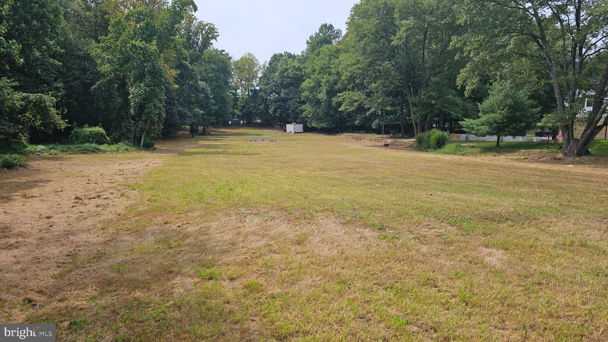5540 Waterloo Road Columbia, MD 21045 - Photo 4 of 9 a view of a field with trees in the background