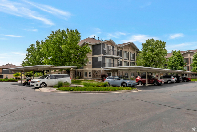 117 Calbourne Lane, Unit I2 Sandy, UT 84070 - Photo 1 of 19 3 Story Condo Building. Covered Parking. Beautiful Landscaping. Mature Trees. Located in Sandy! This is a MAIN level condo.