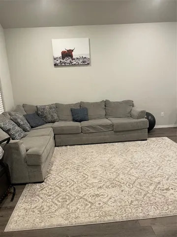 a living room with furniture and a couch