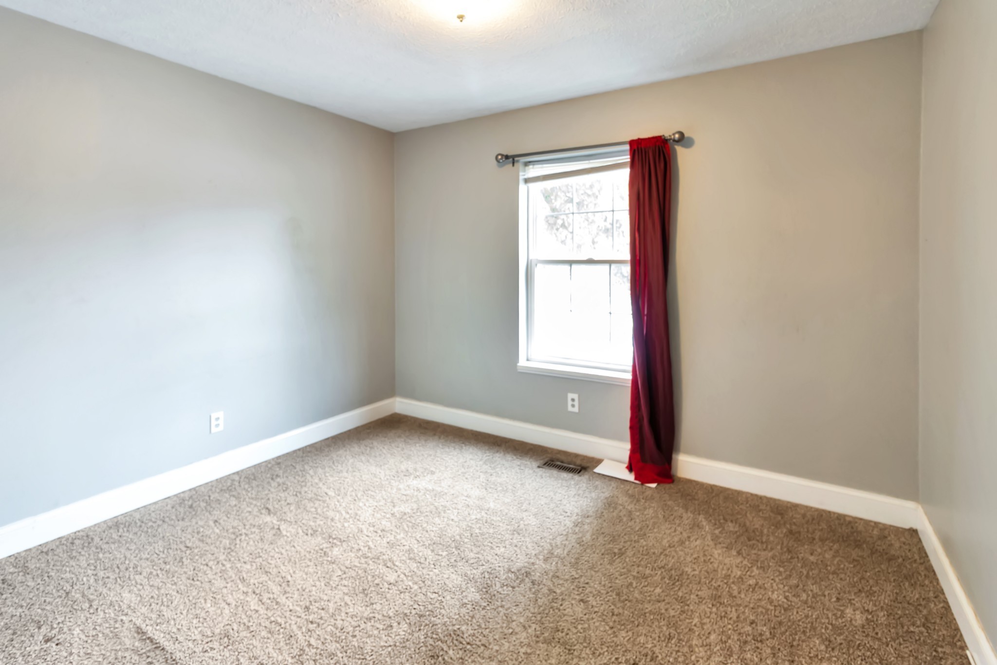 521 Rothwood Avenue Madison, TN 37115 - Photo 3 of 5 an empty room with a window