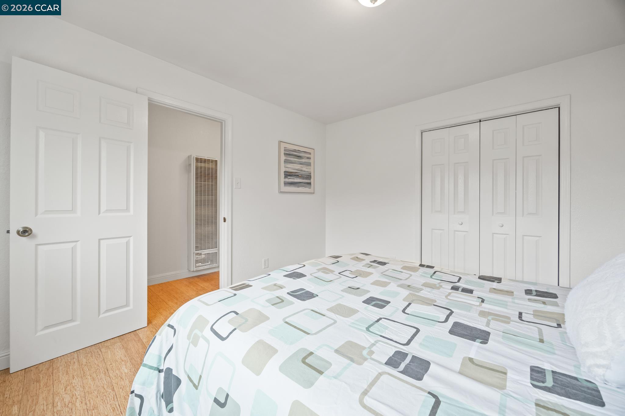 2327 Tenth Street, Unit 4 Berkeley, CA 94710 - Photo 22 of 39 a bedroom with a bed and a window