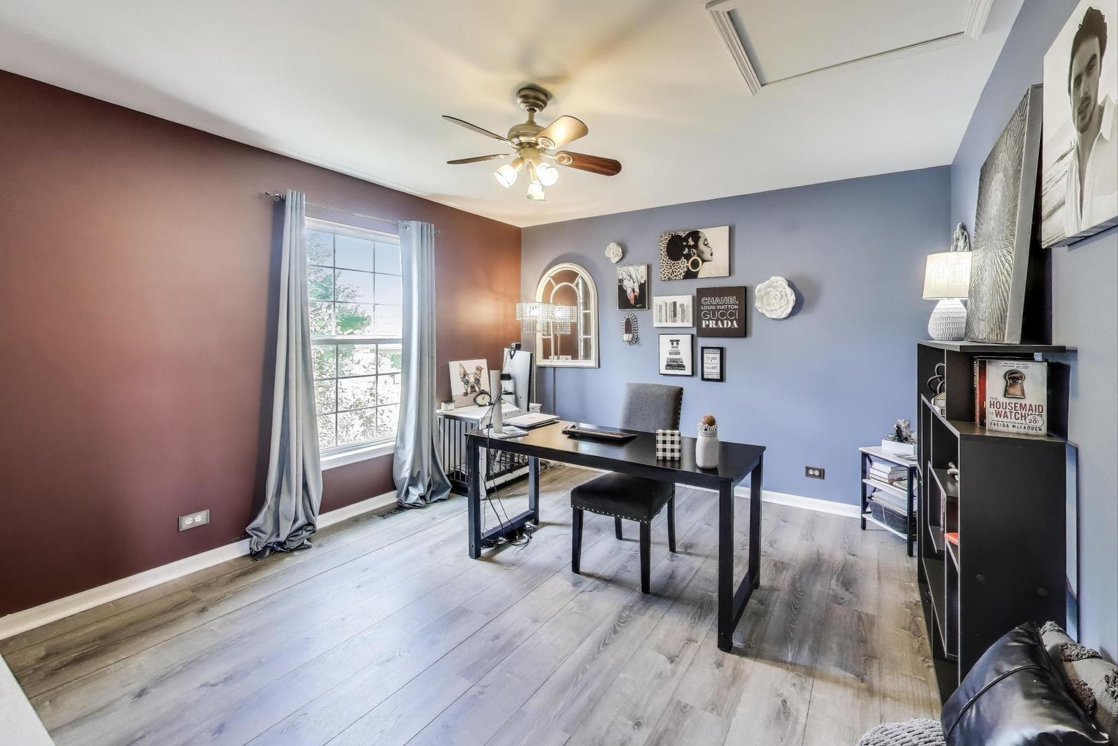 705 Porter Circle Lindenhurst, IL 60046 - Photo 17 of 34 a view of a dining room with furniture and wooden floor