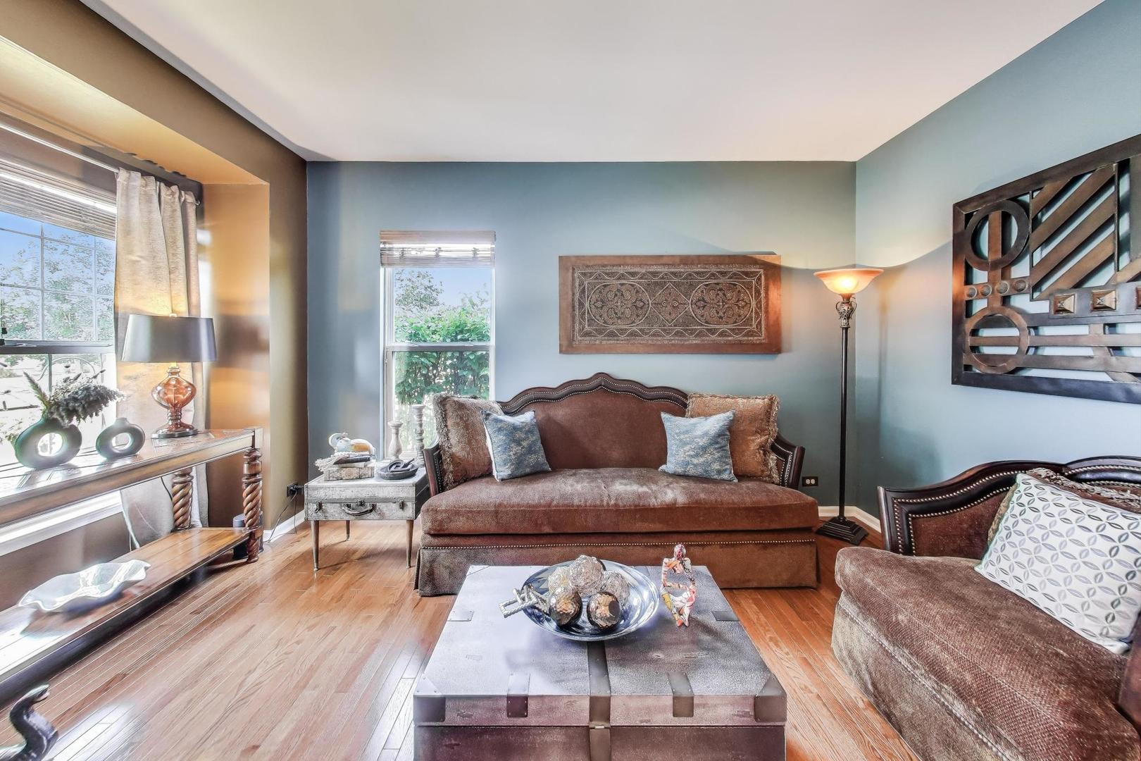 705 Porter Circle Lindenhurst, IL 60046 - Photo 2 of 34 a living room with furniture and wooden floor