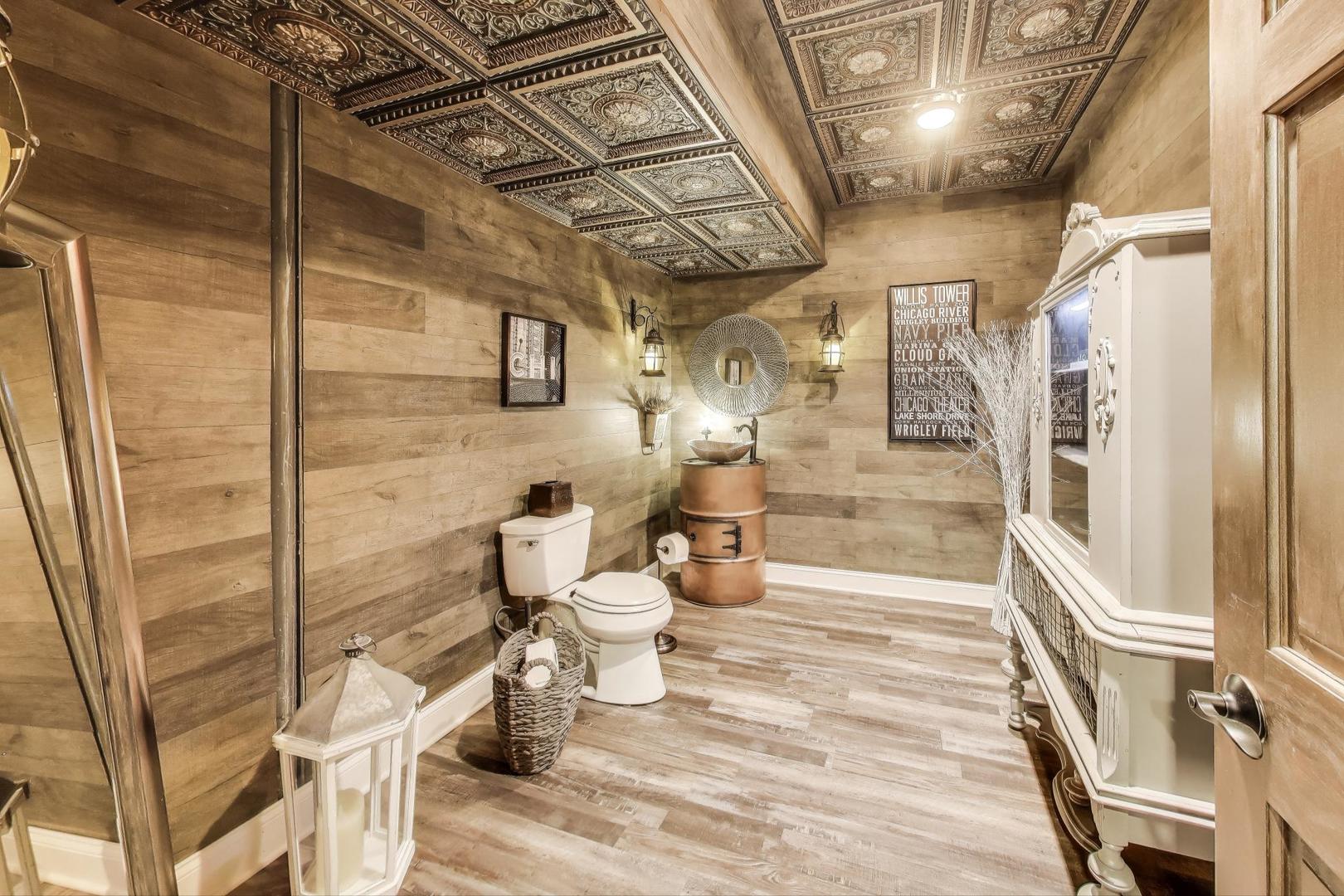 705 Porter Circle Lindenhurst, IL 60046 - Photo 29 of 34 a bathroom with a toilet and a shower