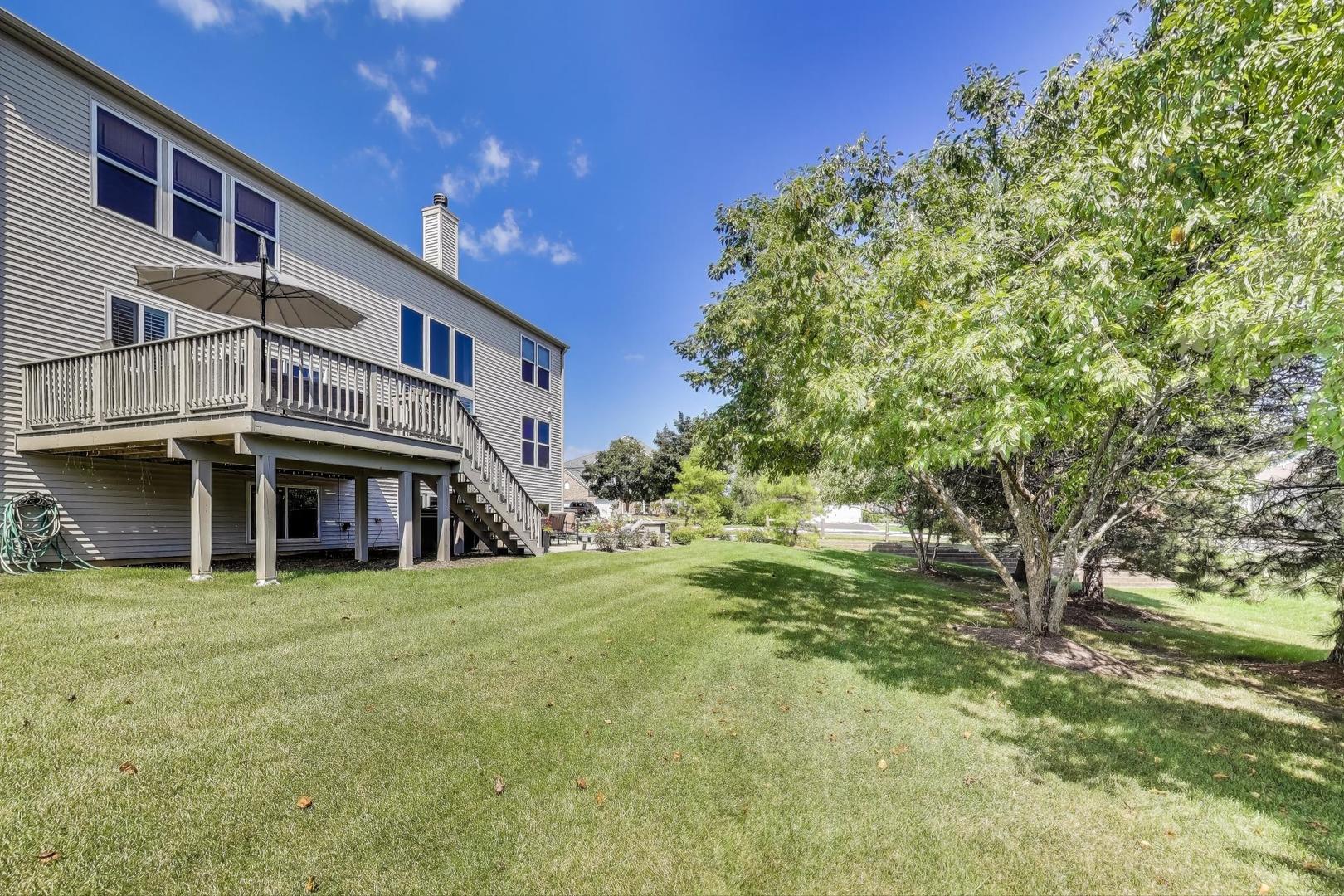 705 Porter Circle Lindenhurst, IL 60046 - Photo 33 of 34 a view of a house with a yard