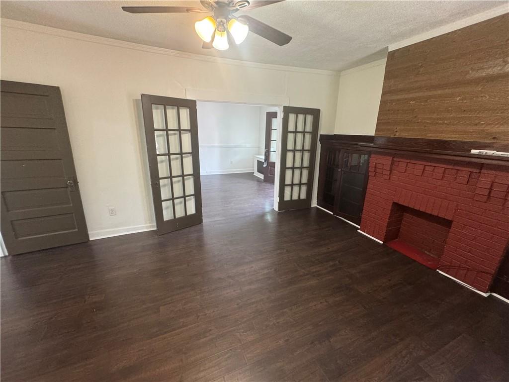 815 Braddock Road Pittsburgh, PA 15221 - Photo 13 of 36 wooden floor in an empty room with a window