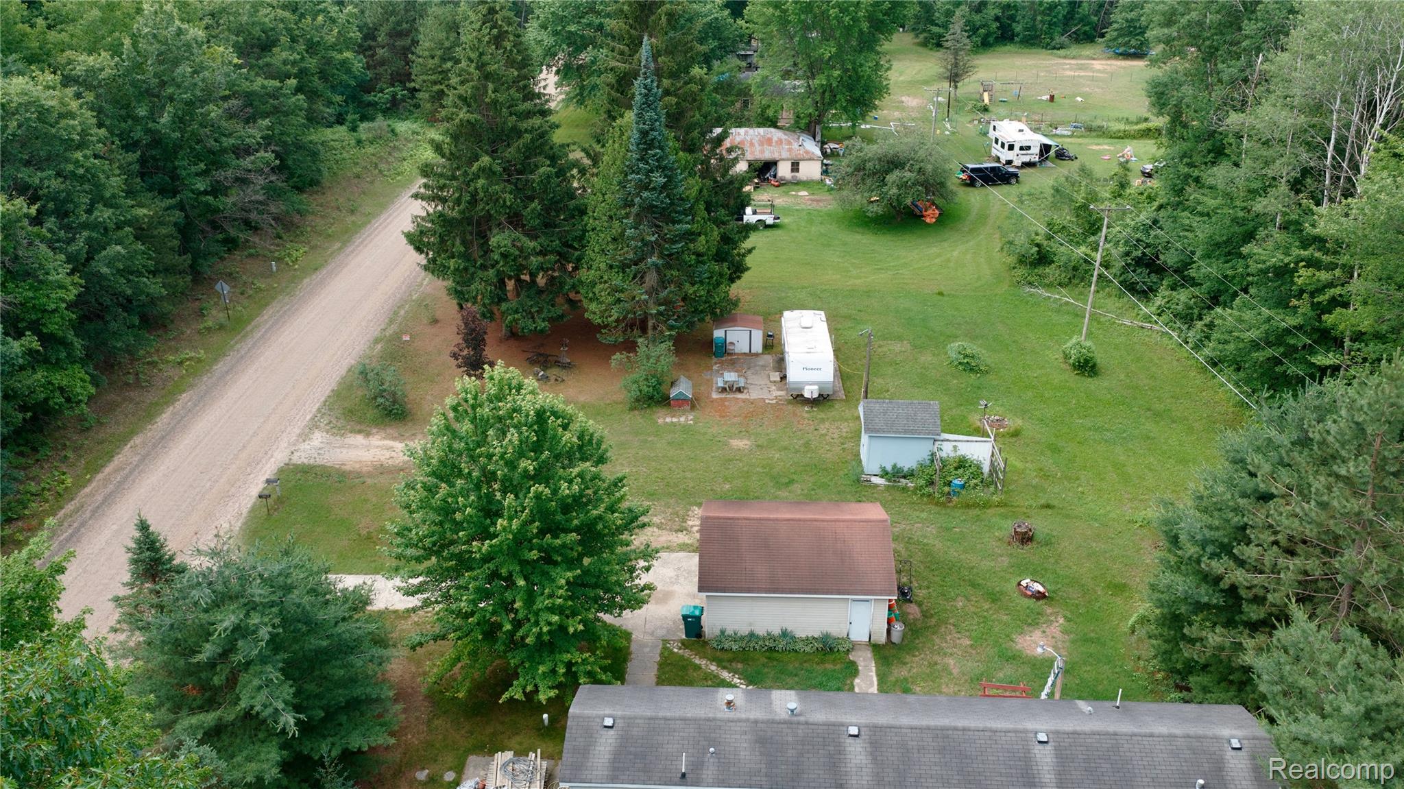 1900 Hay Road Beaverton, MI 48612 - Photo 3 of 8 dji_fly_20260702_104110_0417_1783004997484_photo.jpeg