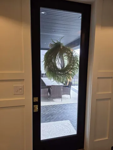 a bedroom with a bed and cabinets