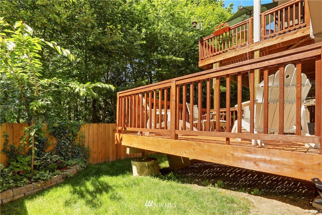 17025 164th Way Southeast Renton, WA 98058 - Photo 22 of 23 a view of a wooden fence with a bench