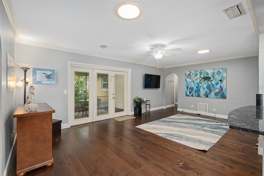744 Cornwall Road Winter Park, FL 32792 - Photo 18 of 57 a living room with furniture and a flat screen tv