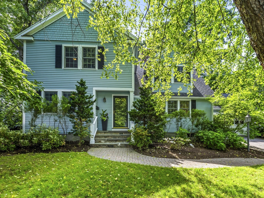 3 Dudley Road Wellesley, MA 02481 - Photo 1 of 25 a front view of a house with a garden