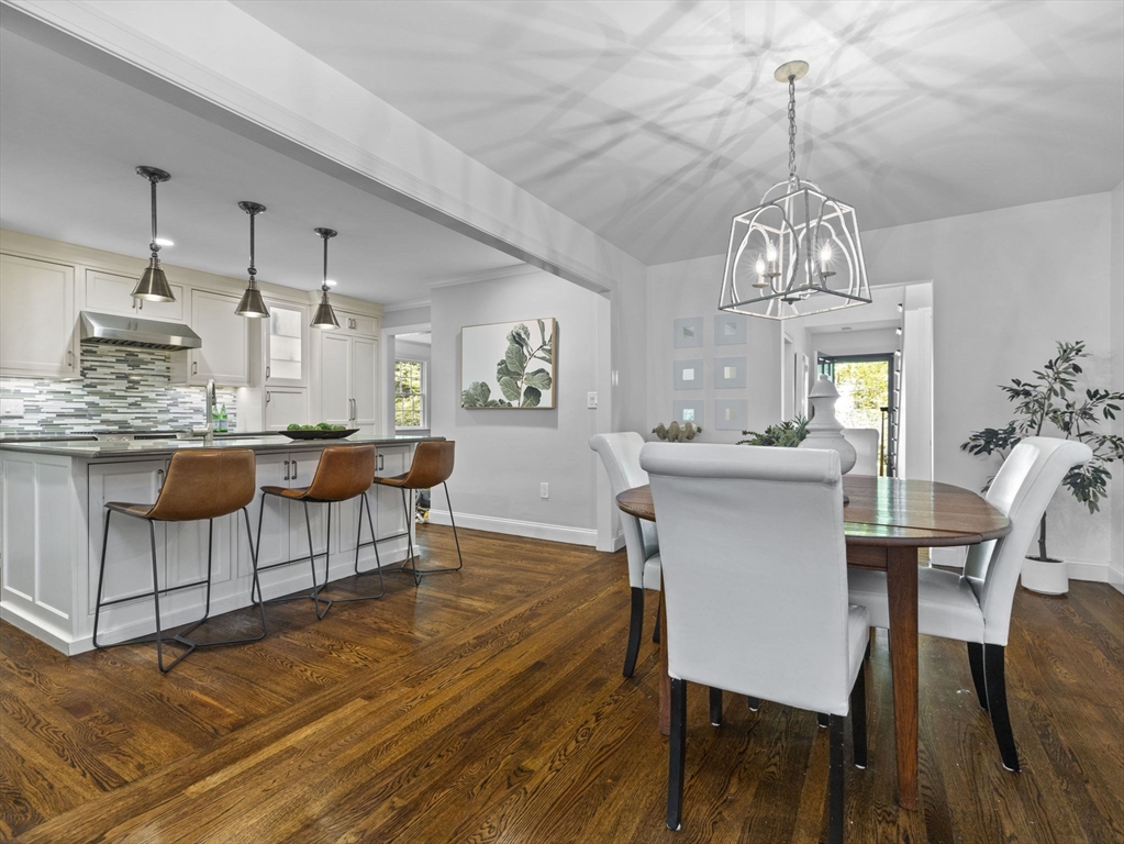 3 Dudley Road Wellesley, MA 02481 - Photo 7 of 25 a view of a dining room with furniture wooden floor and chandelier