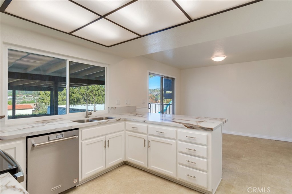 15750 Pounders Drive Riverside, CA 92504 - Photo 14 of 50 Kitchen all new paint, counter tops ,stove