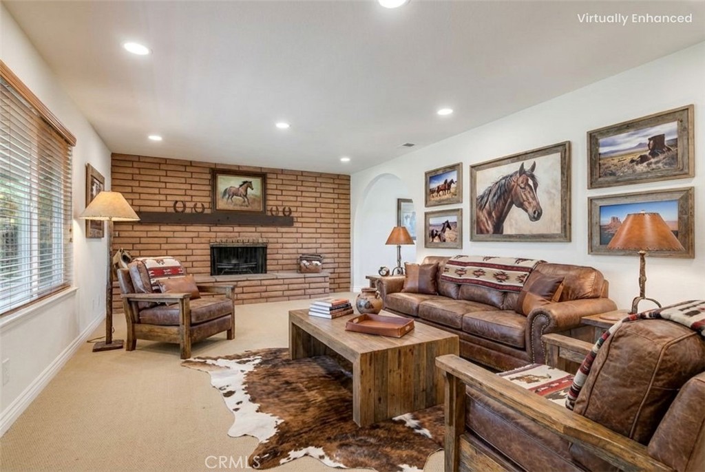 15750 Pounders Drive Riverside, CA 92504 - Photo 19 of 51 a living room with furniture fireplace and flat screen tv