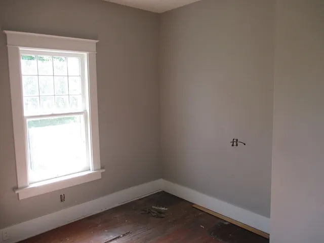 an empty room with a window