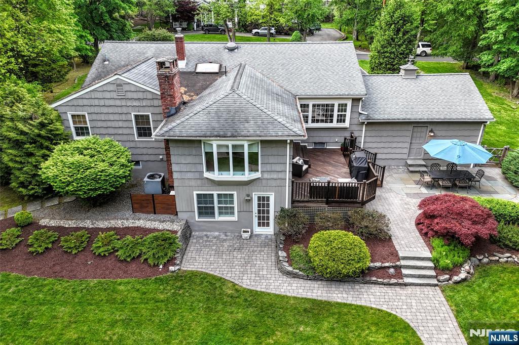 60 Dimmig Road Upper Saddle River, NJ 07458 - Photo 4 of 40 front view of a house with a yard