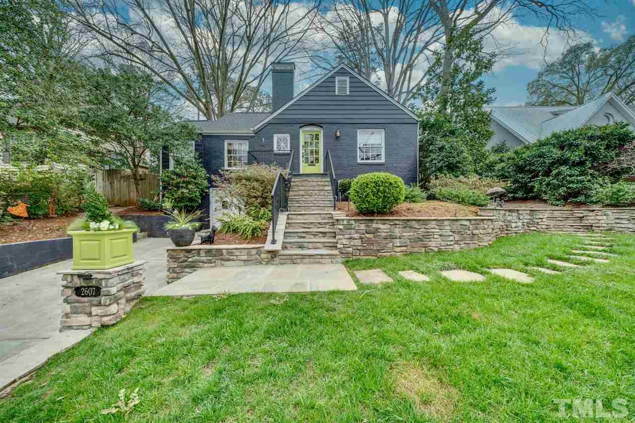 2607 Van Dyke Avenue Raleigh, NC 27607 - Photo 1 of 26 a front view of a house with garden and patio